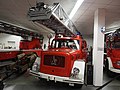 Late design square hood 150DL30 as a turntable ladder truck on a rear wheel drive chassis.