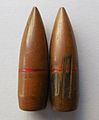 7.62×39mm bullets fired and unfired showing a cannelure red with bullet sealant.