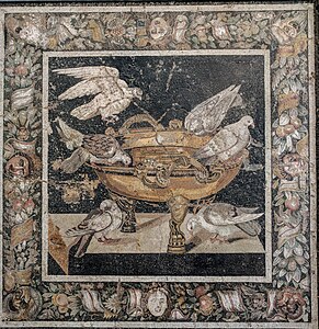 Polychrome Roman mask mascarons on the border of a mosaic with doves drinking from a golden basin, after Sosus of Pergamon, 1st century BC, mosaic, National Archaeological Museum, Naples, Italy[19]