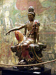 Guanyin of the Southern Seas; 11th-12th century; painted and gilded wood; height: 2.41 m; Nelson-Atkins Museum of Art (Kansas City, Missouri, US)[92]