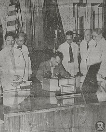 President Manuel L. Quezon signing Executive Order No. 134.