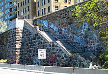 Now-disused staircase leading down from the viewing area to what was once Riverside Drive, but is now the northbound lanes of the Henry Hudson Parkway