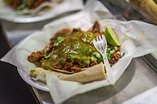 Taco al pastor with guacamole