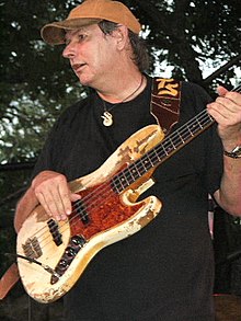 Tommy Shannon performing on stage in 2006