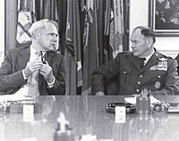 Chairman of The Joint Chiefs of Staff General George S. Brown with Secretary of Defense James Schlesinger during a weekly meeting at The Pentagon on November 8, 1974.