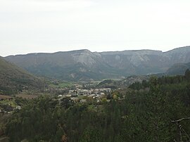 The village of Valbelle nestled in the valley, and the cirque
