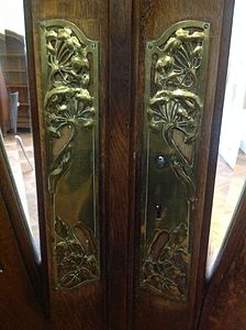Decorative brass plate on vestibule door