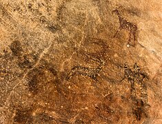 Cave painting of women with animals