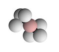 Two silica tetrahedra joined by a bridging oxygen ion (tinted pink)