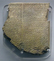 A photograph of a clay tablet with cuneiform writing