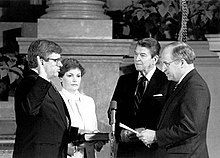 Dick Cheney administers the oath of office to Don Wilson as Mrs. Wilson and President Ronald Reagan look on, December 4, 1987.
