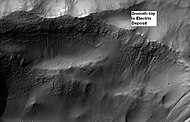Electris Deposit, as seen by HiRISE. Electris deposit is light-toned and smooth in the image in contrast to rough materials below. Location is Phaethontis quadrangle.