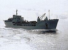 A grey ship with a helipad aft. It has "L3005" painted on the side in large letters.