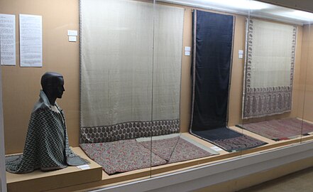 A view of the shawls in the Textiles Gallery. The shawls are from Kashmir