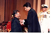 President Pervez Musharraf honoring Mustafa Shameel with the Tamgha-i-Imtiaz, 2001