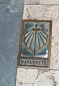 A pavement marker indicates the route of the Way of St James through Navarrete, La Rioja, Spain