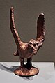 Griffin-Shaped Coffin Nail (replica), 4th-3rd century BCE. Gilt Bronze. Berel Kugan, East Kazakhstan. National Museum of the Republic of Kazakhstan.[9]