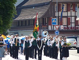 Student procession in 2011, led by the Sternenberg Neuenegg Music Society