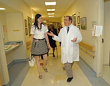 Davis and Gallin walking in a hospital hall
