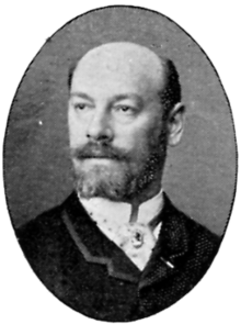 Black and white portrait of Hugo Salmson.