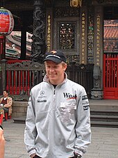 A photograph of Kimi Räikkönen wearing McLaren overalls in 2002. He was one of four drivers to make their Formula One debut in Melbourne.