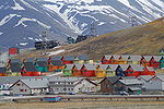 Houses in Longyearbyen, a snow-covered mountain in the background