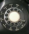 Image 27A traditional North American rotary phone dial. The associative lettering was originally used for dialing named exchanges but was kept because it facilitated memorization of telephone numbers.