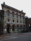 The polychrome brick Venetian Gothic facade of Battersea Park railway station