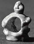 Bead with human form. 8th millennium BC.