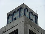 Top of a building with large letters CGT