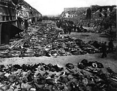 Aftermath of the RAF bombing raid of 3 and 4 April 1945 that destroyed the Boelcke-Kaserne (Boelcke Barracks) located in the south-east of the town of Nordhausen and killed around 1,300 inmates. The barracks was a subcamp of the Mittelbau-Dora Nazi concentration camp. Used as an overflow camp for sick and dying inmates from January 1945, numbers rose from a few hundred to over 6000, and the conditions saw up to 100 inmates die every day.