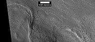 Possible moraine on the end of a past glacier on a mound in Deuteronilus Mensae, as seen by HiRISE, under the HiWish program.