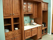 Picture of kitchen cabinet setup in a home center store.