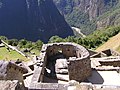 Intihuatana ritual buildings of dry stone at Machu Picchu, Peru