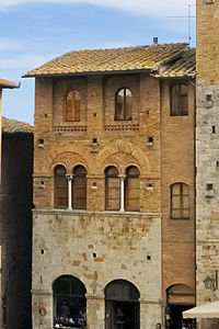 House on the Piazza del Duomo in San Gimignano, Italy.