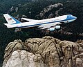 Image 2Air Force One, a Boeing VC-25, flying over Mount Rushmore. Boeing is a major aerospace and defense corporation, originally founded by William E. Boeing in Seattle, Washington.