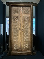 Wooden gate from the Gur-i Mir, with sculpted decoration, traces of polychromy and micro-mosaics (khatamkari). State Museum of History of Culture of Uzbekistan.