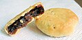 Image 51Eccles cake is a small round flaky pastry cake filled with currants, sugar and spice. It is native to Eccles. (from Greater Manchester)