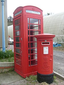 Edward VII pillar box in front of a K6 Telephone box.