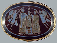 A carved and gilded gemstone made by Flavius Romulus depicting the coronation of Valentinian III. C. 425 A.D.