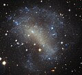 IC 4710 lies roughly 25 million light-years away in the southern constellation of Pavo.[10]
