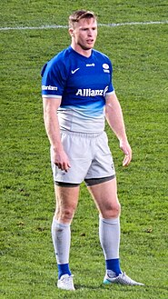 Chris Ashton wearing a [[Saracens F.C.�Saracens]] blue jersey in 2015