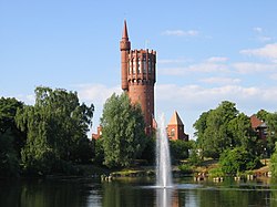The old water tower viewed across St. Olof's lake