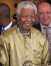 Photograph of Nelson Mandela smiling. Taken in the year 2008.