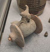 Ram-headed bird mounted on wheels, probably a toy; 2600-1900 BC; terracotta; Guimet Museum (Paris)