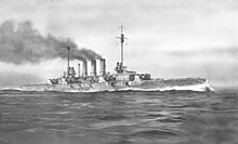 A large gray warship steams at high speed in choppy water; thick black smoke pours from three tall smoke stacks in the middle of the ship