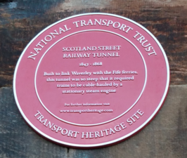 A plaque marking the north end of the Scotland Street Tunnel.