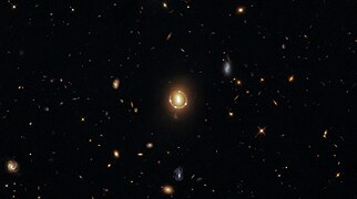 "Seeing Quintuple" a phenomenon known as gravitational lensing.