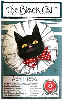 A black cat's head, with a red and white polka dotted bow tie under its chin, looks out from a large white rosette