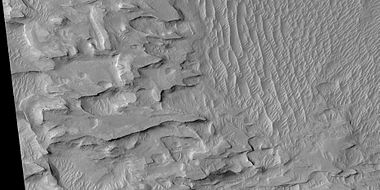 Close view of layers in a mound, from a previous image, as seen by HiRISE under HiWish program